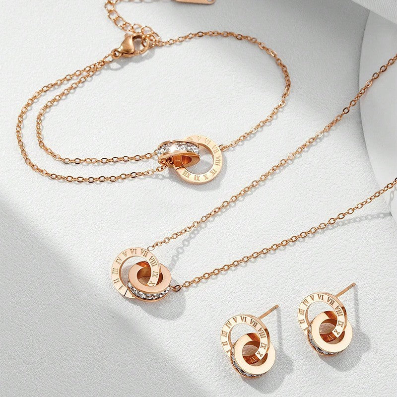 Parure Rosé (Bracelet, Collier, Boucles d'oreilles) à motif Chiffres Romains